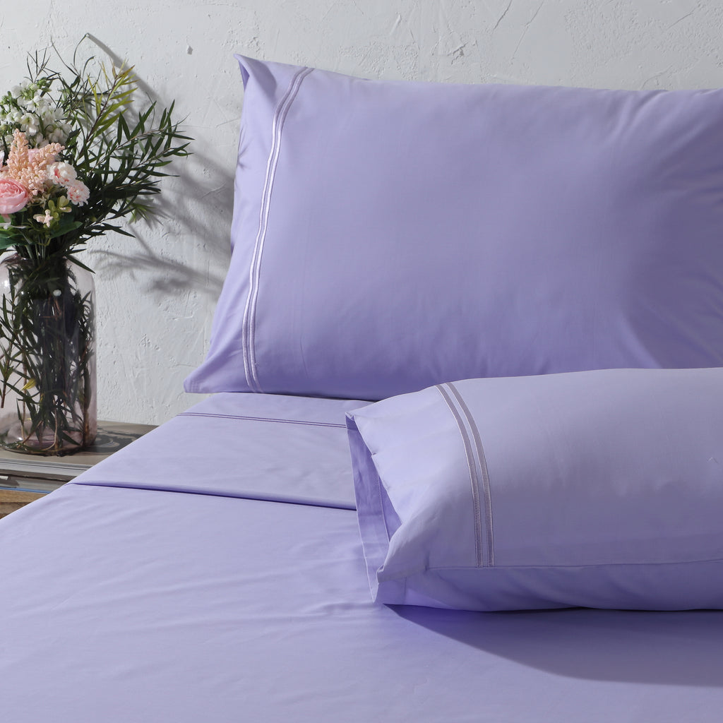 Lavender Mist 200TC organic cotton dyed embroidered sheet set – pastel lavender tone, subtle embroidery detail, breathable percale, single and king sizes