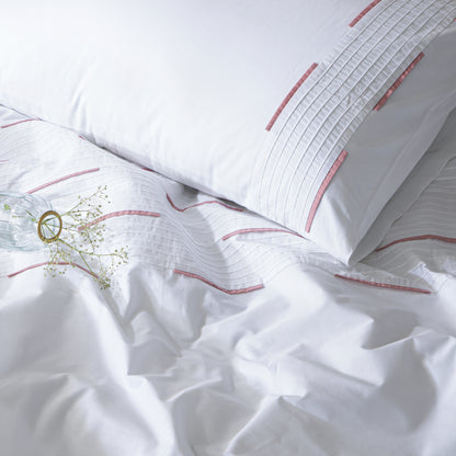 Linette organic cotton percale duvet cover set with pintucks and red pleats on pillow, 200 TC