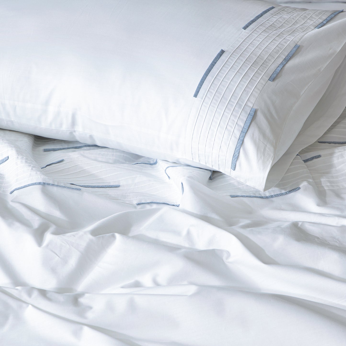 Linette organic cotton percale duvet cover set with pintucks and blue pleats, 200 TC