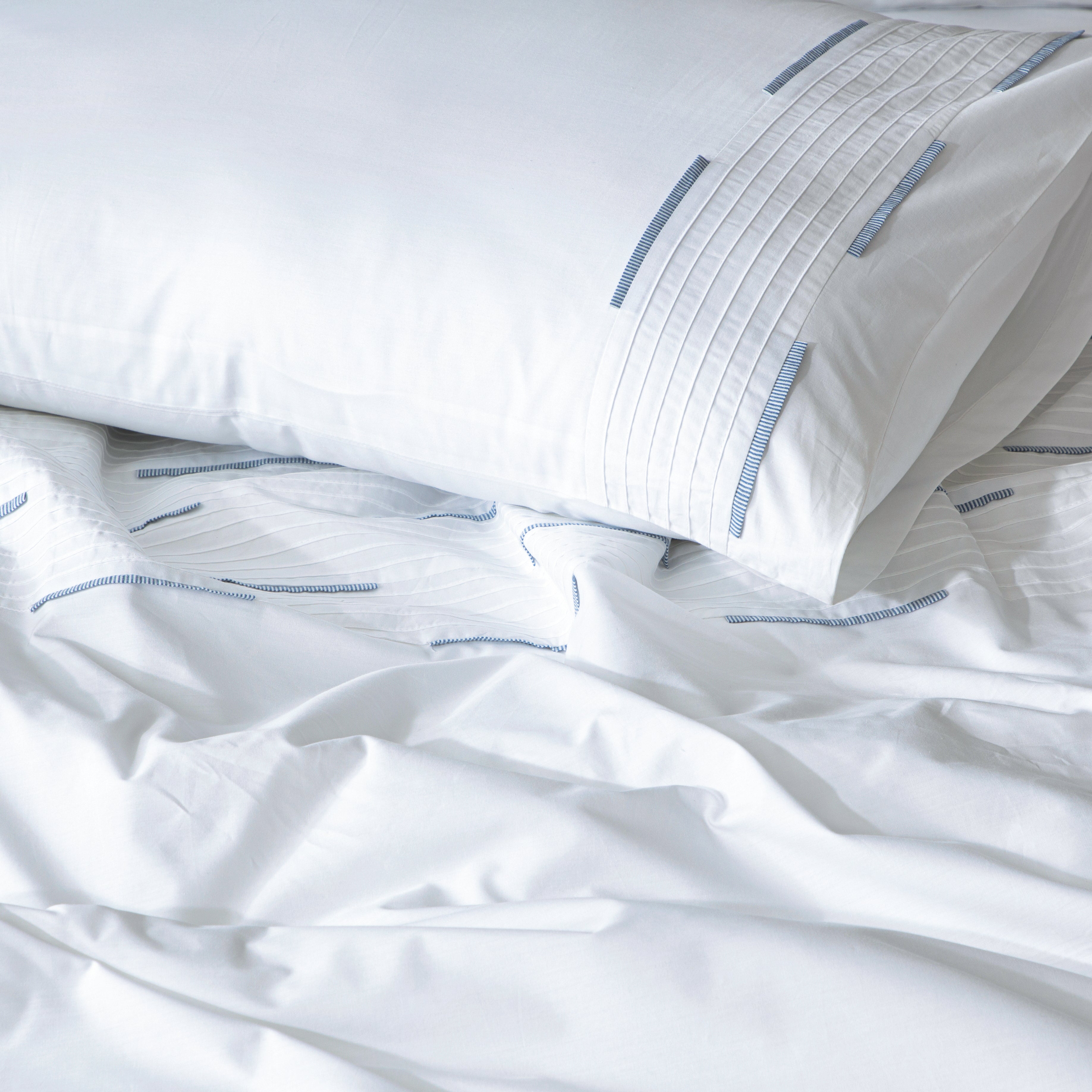 Linette organic cotton percale duvet cover set with pintucks and blue pleats, 200 TC