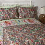 Reverse side of Paisley Romance dohar – artistic stripe design echoing the teal, coral and rose tones of the paisley front, 100% organic cotton percale