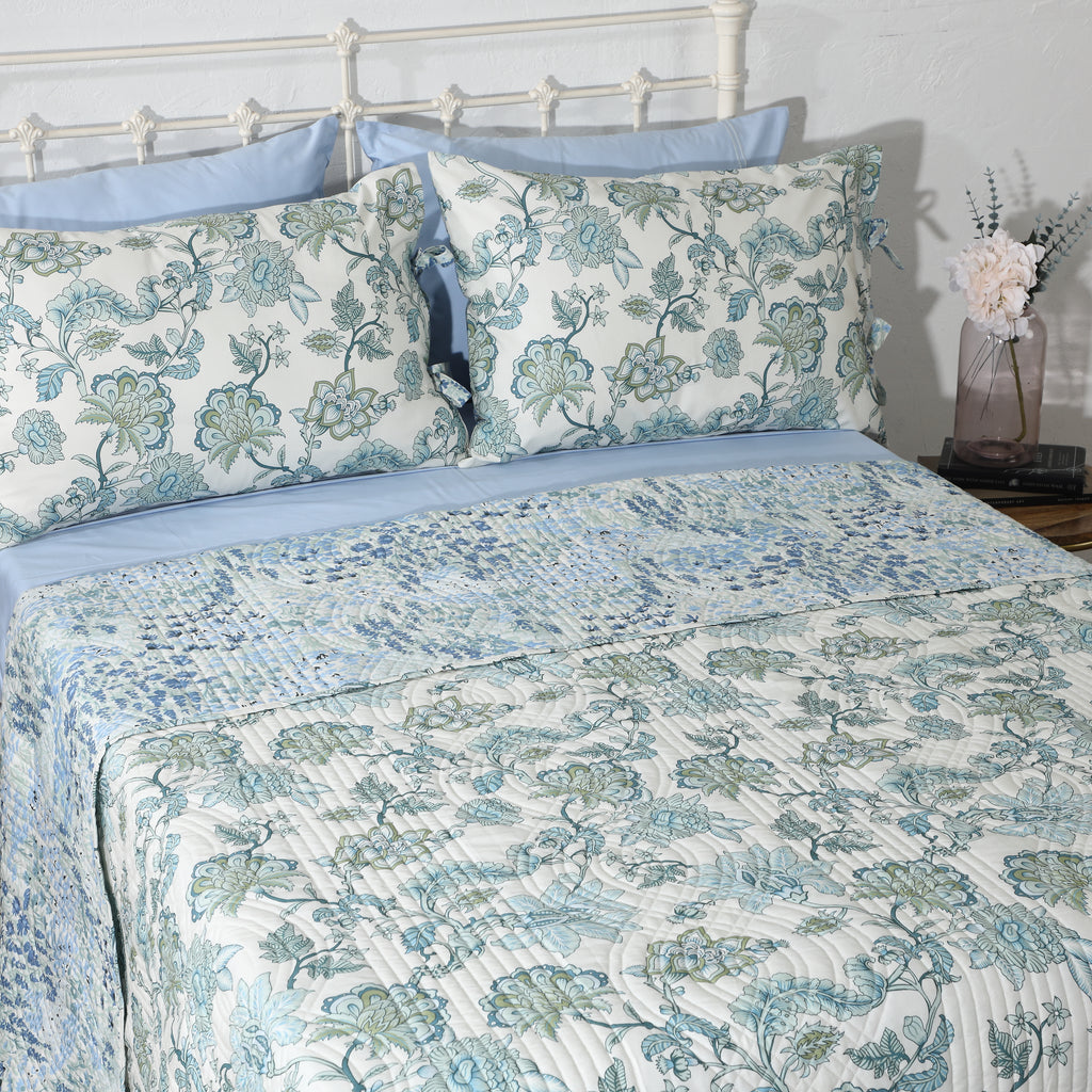 Matching reversible pillowcase from the Jacobean Windflower cotton percale dohar set – ivory botanical front and coral-terracotta reverse, tie closure, Whites of London