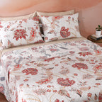 Matching reversible pillowcase from the Jacobean Summer dohar set – ivory botanical front and coral-terracotta reverse with tie closure, cotton percale, Whites of London