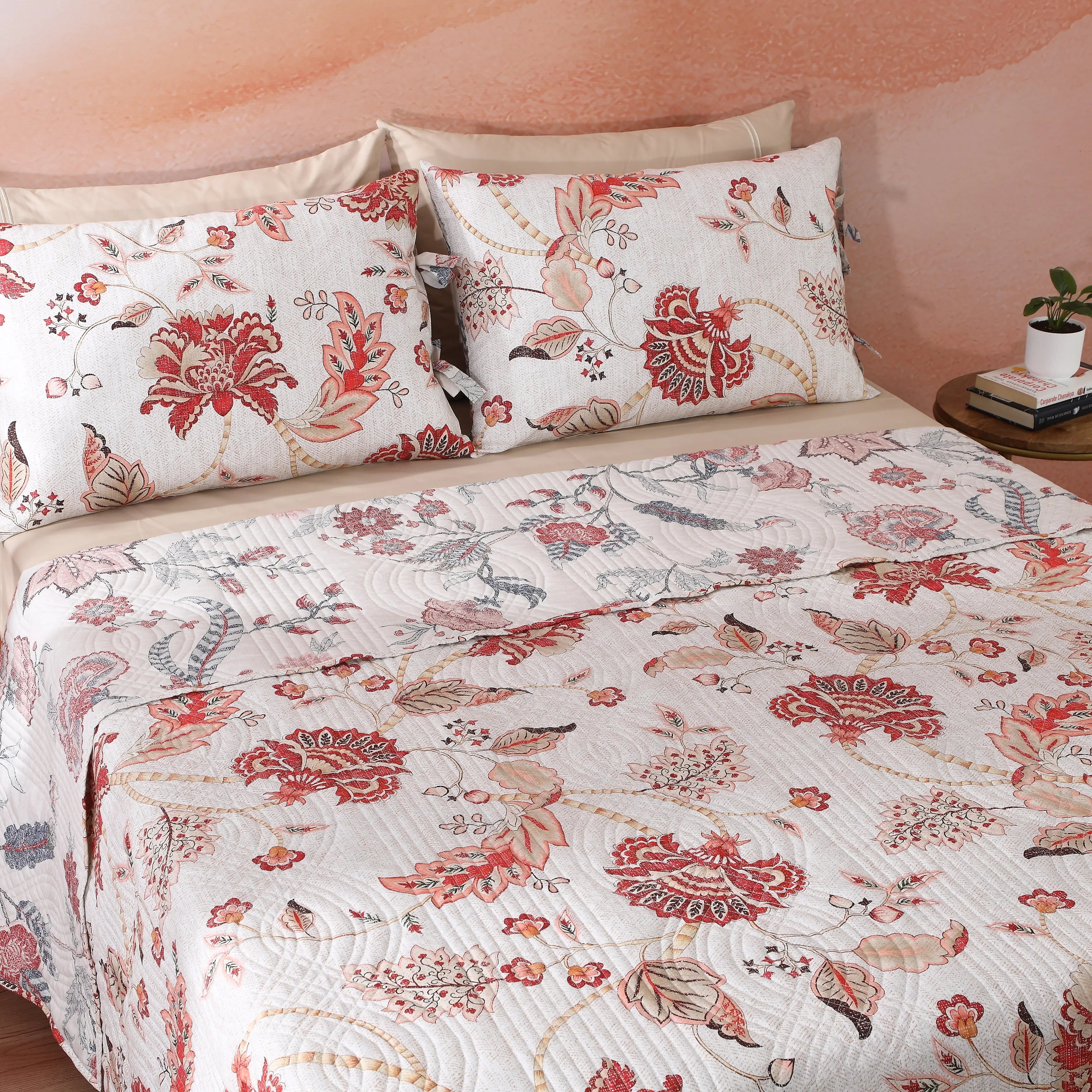 Matching reversible pillowcase from the Jacobean Summer dohar set – ivory botanical front and coral-terracotta reverse with tie closure, cotton percale, Whites of London