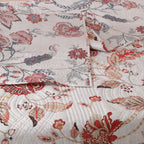 Flat lay of Jacobean Summer reversible dohar – ivory with blush-coral and slate-blue one side, coral and terracotta florals on the reverse, 100% cotton percale