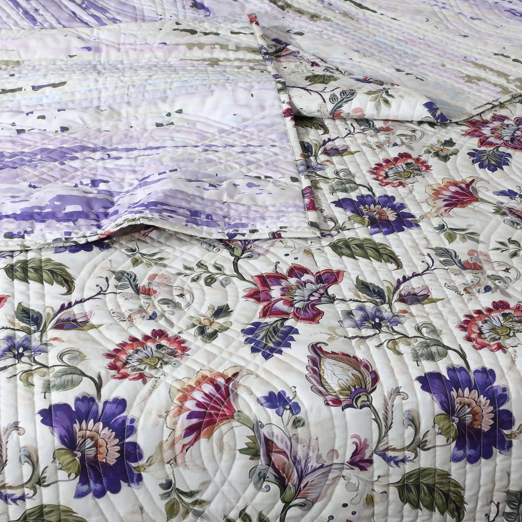 Close-up of quilted texture and floral print on Lavender Fields percale dohar – soft ivory base with painterly lavender and blush blooms