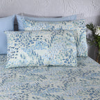 Close-up of Windflower percale pillowcases – fine leafy sprays and delicate wildflower print in soft blue, sage and ivory on 200 TC organic cotton