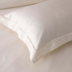 Close-up of hand-stitched embroidery line on ivory organic cotton oxford pillowcase flange – 600 TC, Whites of London India