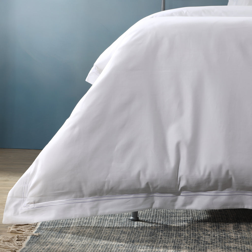 White 1000 TC organic cotton duvet cover set styled on a bed – long-staple cotton with marrow embroidery, Oxford pillowcases and envelope closure