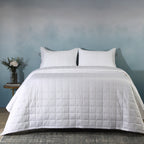 White bamboo cotton bedspread set on a luxury styled bed – 60% bamboo 40% cotton coverlet with timeless quilting design, lightweight and breathable, Whites of London India