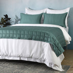 Bamboo cotton bedspread set in teal styled on a bed – lightweight quilted coverlet in a 60/40 bamboo cotton blend, gentle on skin and naturally breathable