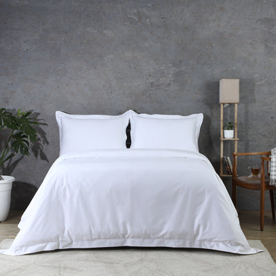 Two white organic cotton oxford pillowcases flat lay – 600 TC with single-stitched embroidered border, 50x75cm set of 2