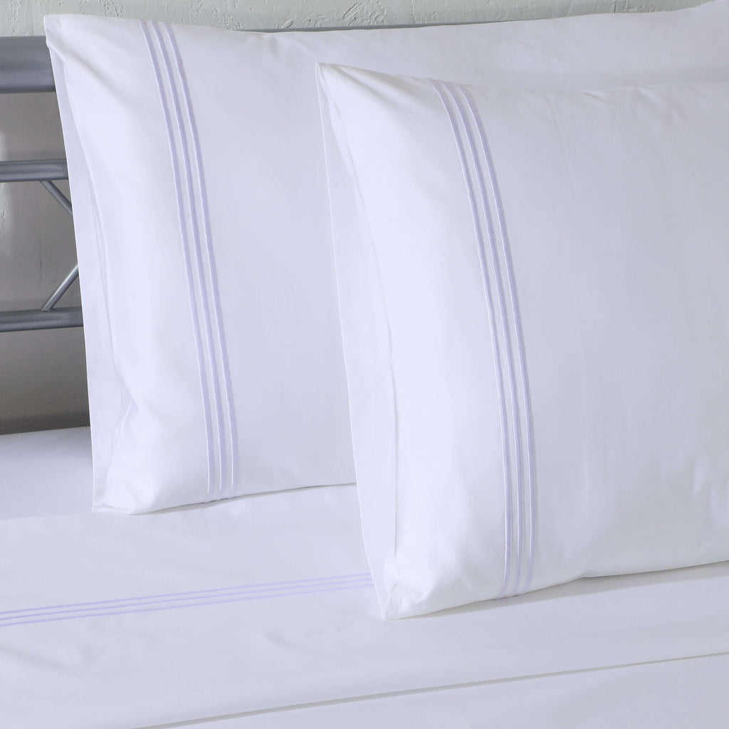White 1000 TC organic cotton housewife pillowcase with three-line embroidery detail – dense, silky weave, part of the embroidered sheet set by Whites of London