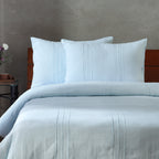 Heirloom — 100% linen pintucks and hemstitched embroidered duvet cover and pillowcases set in glacier blue