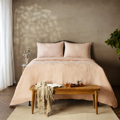 Peach Blossom European flax linen duvet cover set on a luxury styled bed – hand-tailored pintucks and Victorian hemstitching, naturally textured and breathable, Whites of London